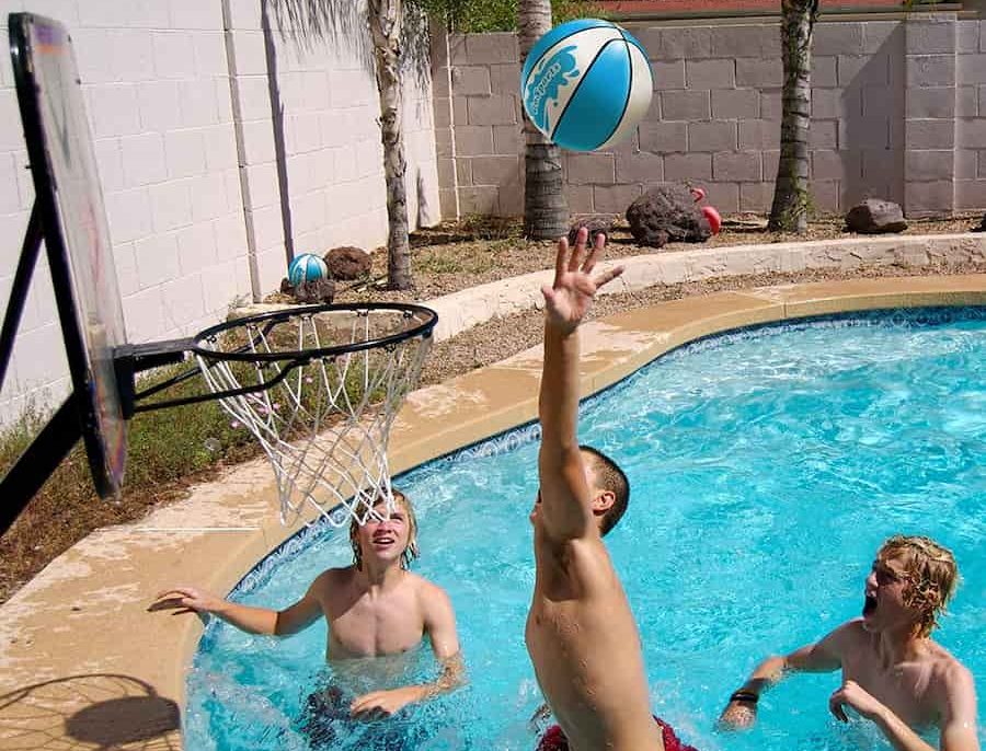 kids playing pool basketball