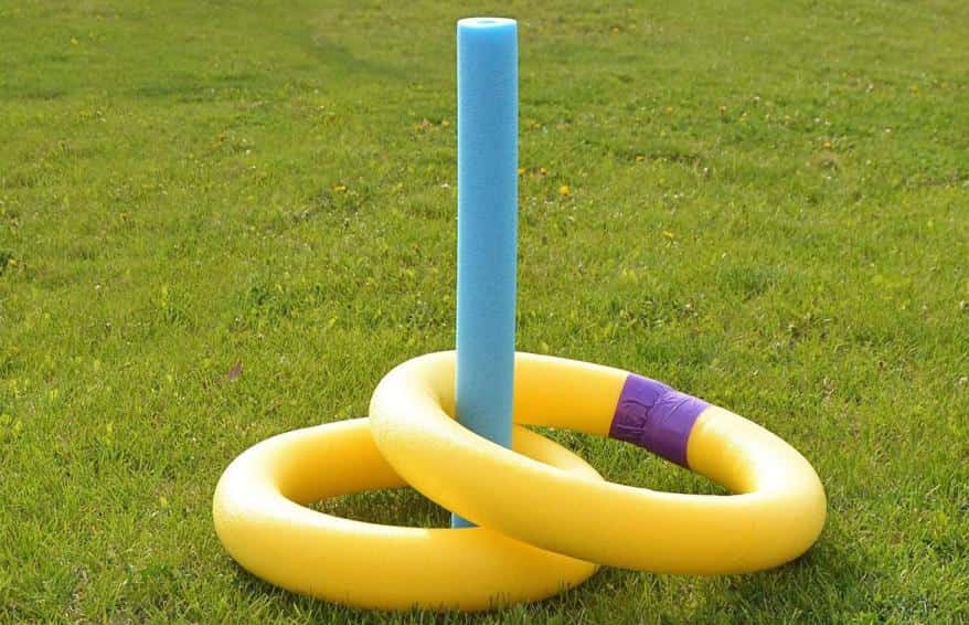 pool noodles shaped as a ring toss game